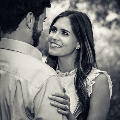 bay area photographer couples engagement photography olive grove bride smile black and white